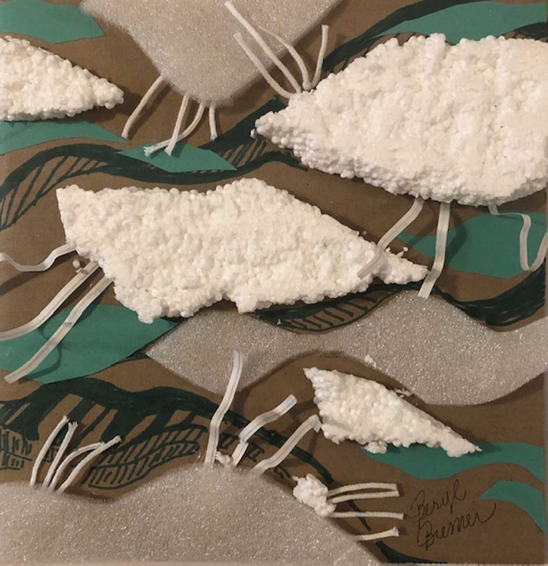 Materials like paper, styrofoam, and fabric blend together to create an underwater scene of brown, green, and white.