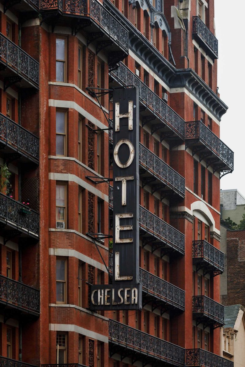 Outside of the Hotel Chelsea, featuring it's iconic sign.