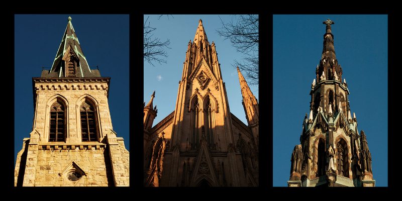 Triptych of the tops of three Baltimore churches taken from below so that the top is very large and intimidating.