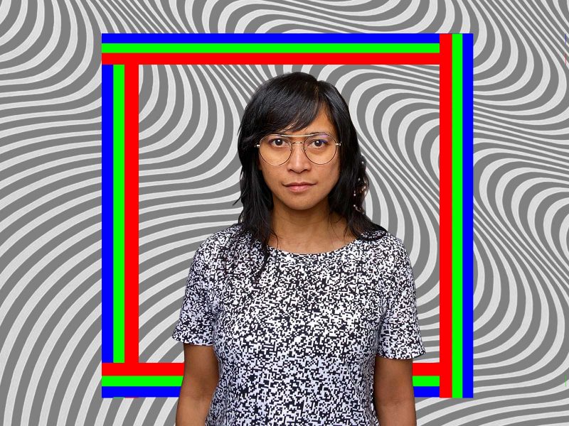 Maria Dumlao, a Filipino woman with shoulder length black hair, eyebrow length bangs, and eyeglasses, in front of a digitally rendered decorative background.