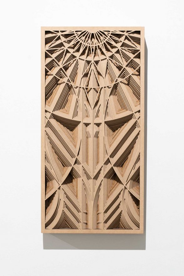 Vertically rectangular hanging artwork crafted out of wood, featuring intricate lines and panels that resemble a church ceiling.