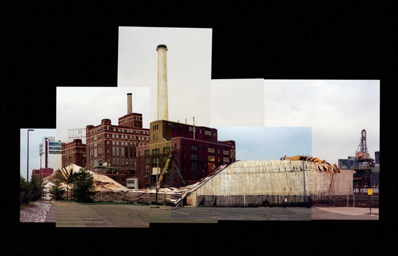 Photo collage of the Domino Sugar plant in Baltimore, MD, captured from the facility's parking lot, where the collapsed sugar shed is visible. The building nearest the shed has a temporary support beam strapped to it from below.