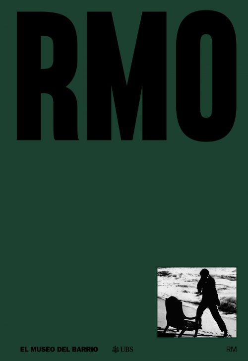 Dark green book cover with the title "RMO" at the top, a photo of Raphael Montañez Ortiz doing a performance on the beach at the bottom-righthand corner, and the name of the publisher "EL MUSEUM DEL BARRIO" in the bottom lefthand corner.
