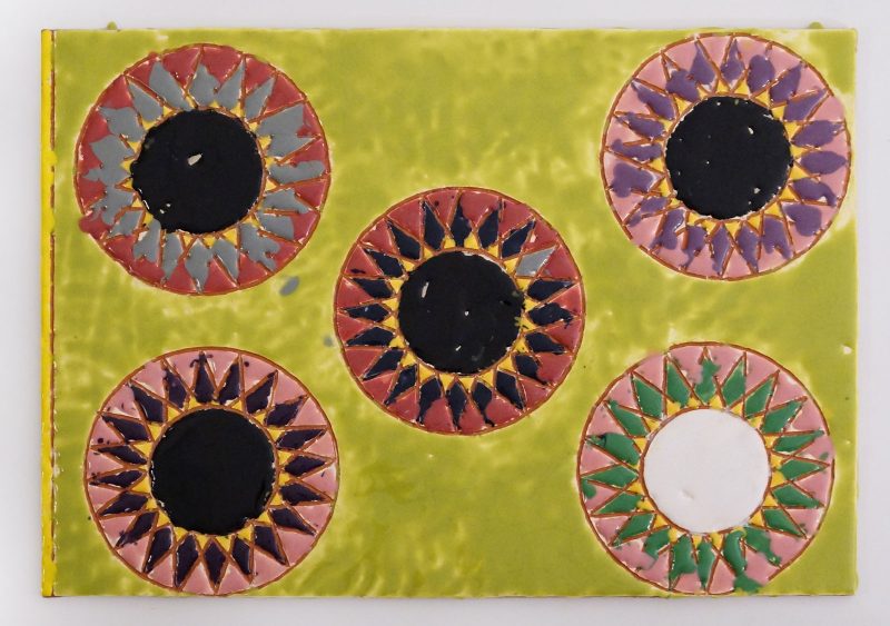 Abstract artwork with a lime green background, with five red and purple circles with geometrical drawings of dandelions inside of them.