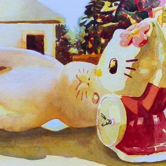A colorful watercolor painting shows a closeup of a cat doll lying on its side with a house and trees in the background.