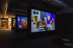 Gallery view of Jayson Musson's show at the Fabric Workshop Museum, showing the projection screens and set from his video-based show.