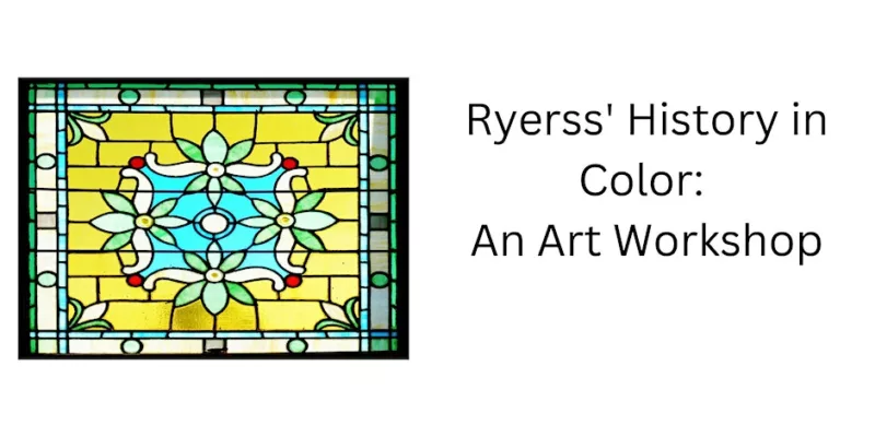 A stained glass window of a green and blue flower motif with a green border around.