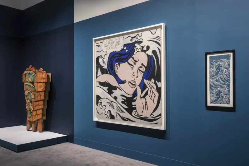 Image of gallery wall featuring a Roy Lichtenstein piece inspired by Hokusai alongside some companion pieces in the show.