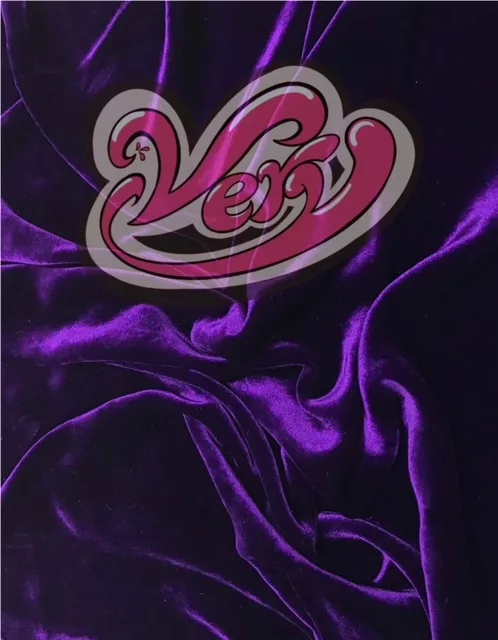 A magazine cover with a logo, “Very” in pink bubble letters at the top sits on a velvety purple background.