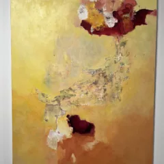 An abstract painting primarily in yellows, with touches of dark reds, ochres, white and green, evokes movement of breath or wind between two spheres.