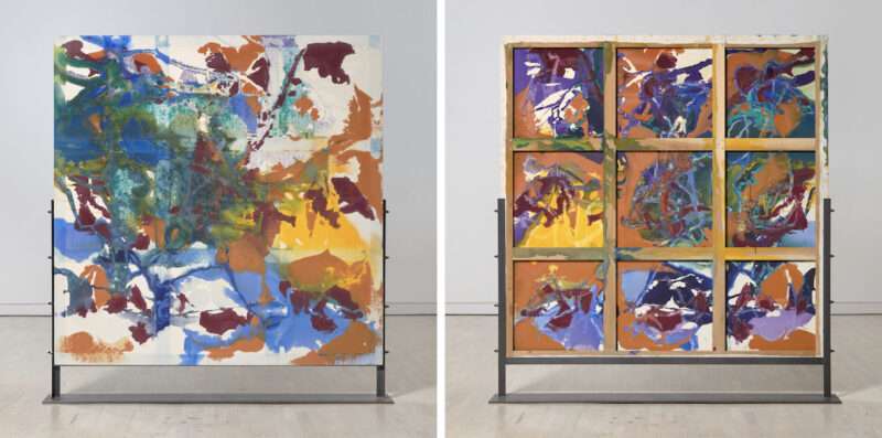 Two views of a double-sided abstract painting, the left (front) view has abrupt passages of brown and yellow and deep purple covered by lighter washes of dark blue; the right (rear) view, which is behind the painting’s gridded wood frame armature, presents nine individual abstract works in each cell of the 9-cell grid.