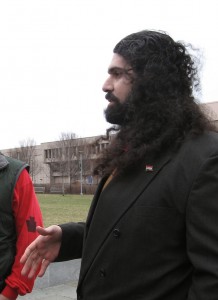 Artist Esam Pasha in front of the National Constitution Center