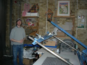 Sam Arthur with the screen press, in the basement