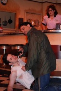 Red Ryder Robert Da Ponte, Russ Widdall, and Maria Panvini in When you comin back, Red Ryder?, New City Stage Company; photo by Jessica Lynn Reed