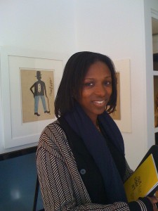 Bomi Odufunade, a London-based consultant with Dash & Rallo Art Advisory in front a work by Bill Traylor in Karen Lennox's suite. 