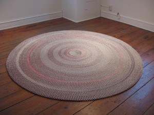 Amy S. Kauffman's rug made from folded Tootsie Roll wrappers, installed in Hopkins House