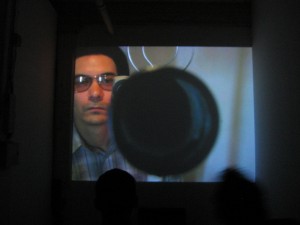Ronnie Bass (as the Astronomer) in his video installation Astronomer Part 1: Departure from Shed