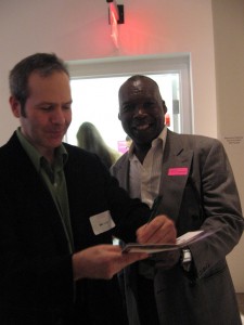Smith autographing a happy FWM member's exhibition brochure.