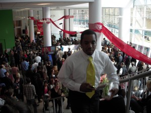 catereryellowtie Caterer running upstairs. Don't you love the yellow tie? Some of the staff had orange ties.