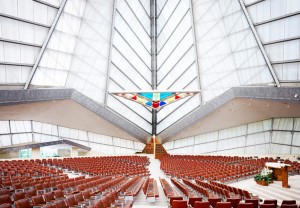 Candida Hofer, Beth Shalom Synagogue Philadelphia I. 2007 C-print. 72 7/8 x 97 ¼ inches (185 x 247 cm). Photo courtesy Sonnabend Gallery. The photo captures the building's nautical charms. The sails, the mast...and the almost '50s auto ornament colored sculpture are captured beautifully.