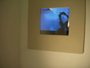 Constantina Zavitsanos' mirror and video piece catches you coming and going. Zavitsanos has a similar piece in her Fleisher Challenge show.
