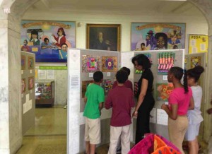 Students at Jay Cooke Elementary look at art in the Cooke Museum of Art exhibit.
