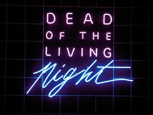 Neon sign on the black box created for Dead of the Living Night