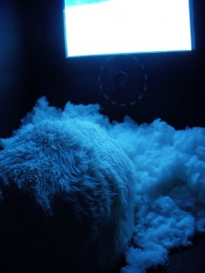 Neverending Story-like shaggy dog you can sit on to watch the video projection of clouds and psychedelic moving lights