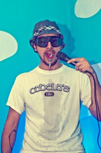 golas hat and spit Chris Golas in his performance Dumb. He is drooling thanks to the effects of chewing on dieffenbachia leaves. All photos courtesy Exclamation Gallery.