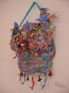 Gretchen Shannon, Kukusu Meiken, Refuge for the Songbird, plaster cast, hand painted, hand sewn, stamped, stenciled collage, wire mesh sculpture, hand-dyed paper, beads and buttons