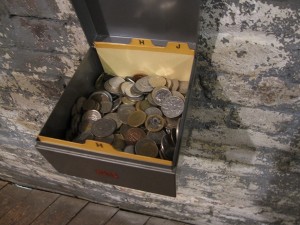 Permanent Collection, detail view. The box of coins at the bottom.