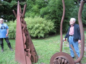 Dave Henderson and Jake Grossberg with his sculpture "Apollo and Pythia".