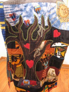 Kooki Davis, Ancestry and Innovation, detail, piecework, applique and embroidery; narrative coat created for Linda Goss performance at the Delaware Art Museum, 2009, from the collection of Linda Goss