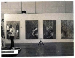 Jasper Johns and James Meyer in the studio. Photo by Hans Namuth. according to James Meyer, the photo was taken in Johns' Houston Street studio, the old Provident Loan Society lobby.