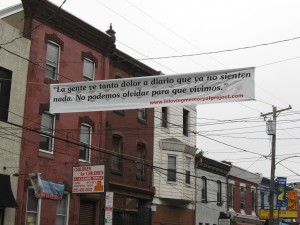 Pepon Osorio, a banner right outside Taller Puertorriqueno on North 5th Street, from the In Loving Memory of... project.