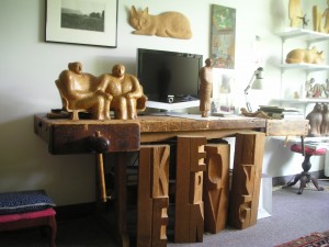 On Making Lots of Woodchips - Evelyn Keyser at 87 4 Keyser's woodworking bench with sculptures; the carved letters which spell "Keep Moving" were the last works she made