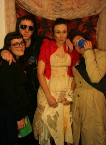 Posing for a photo at the Polygamist Prom photo booth, by Liv Helgesen, Liz Thamm, and Melissa Nannen, photo courtesy Little Berlin