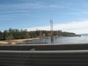 On I-95 we saw these DIY catenary structures made of wooden poles that still showed their tree shape. The modern communications lines held up by these wobbly-looking poles standing in water seemed odd and vulnerable to the elements.