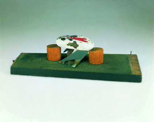 Joan Miro, Object (1932). Painted stone, shell, wood, mirror, sequins, 5 1/2 x 22 x 9 3/4 in, PMA.