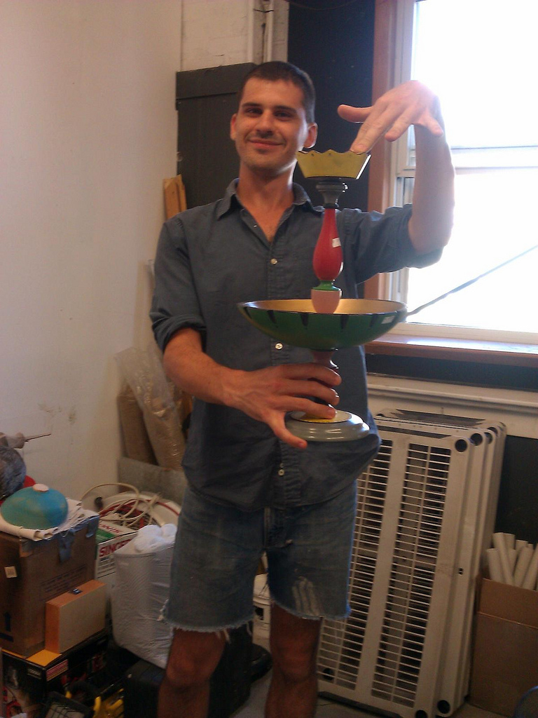 Matt Savitsky, amid packing boxes, showing off one of his favorite objets!