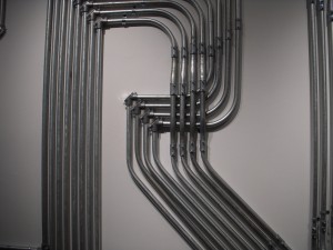 Trophy, detail. Look at that woven conduit. Made for the show, its installation took a while, said Gallerist John Ollman, marveling at the labor involved.