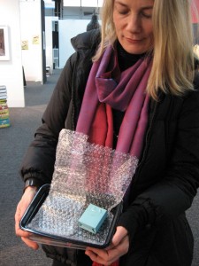 Rachel Perry Welty showing us one of her Tiffany's shopping bags--an emergency restocking of Yancey Richarson's shelves!