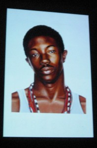 Kehinde Wiley painting of a mugshot on a Wanted poster he saw walking down a Harlem Street